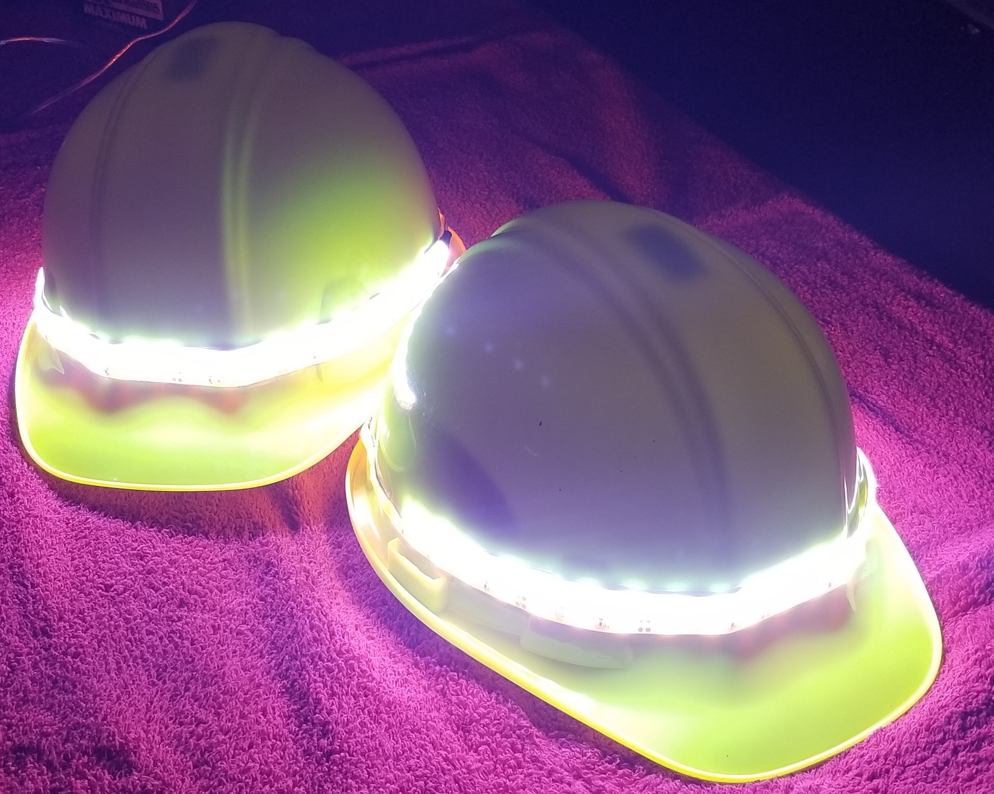 TCP lime green hard hat, outfitted with the SeeMe--Now Led Light system